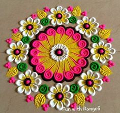 this is an image of a colorful flower design on the wall or floor with white, yellow and pink flowers