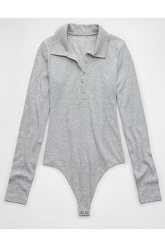 Super soft ribbed fabric/Collared neck with button placket/Thong bottom for a clean look under clothes Casual Long Sleeve Ribbed Bodysuit, Stretch Tops With Button Closure For Loungewear, Casual Spring Bodysuit With Button Closure, Fall Long Sleeve Bodysuit With Button Closure, Fitted Button-up Loungewear Top, Fitted Button-up Top For Loungewear, Casual Solid Bodysuit With Button Closure, Trendy Stretch Bodysuit With Button Closure, Casual Bodysuit For Workwear In Winter