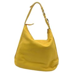 Beautiful Fay tote hobo bag in Yellow leather. Iconic carabiner detailing on the shoulder strap in gold metal. Brown fabric lining. 1 side zip pocket and 1 sideslip pocket inside. 'Fay' tag inside Condition A - EXCELLENT Gently used. Minimal wear of use on leather. Please check the photos carefully and ask if you need to know more details or if you have any doubts. Details MATERIAL: Leather COLOR: Yellow MODEL: n.a. GENDER: Women COUNTRY OF MANUFACTURE: Italy SIZE: Medium FABRIC TYPE: Leather MATERIAL PROCESSING: n.a. MATERIAL EFFECT: n.a. ALL APPLIQUE: Metal Applications HANDLE STYLE: Shoulder Strap DESIGN: Solid colour BAGS HANDLES: n.a. BAGS SHOULDER STRAP: Adjustable shoulder strap BAGS CLOSURE: Zipper closure BAGS BOTTOM: Bottom with studs BAGS POCKETS: Internal zip pocket BAGS ACCESS Yellow Hobo Bag With Leather Handles For Everyday, Yellow Large Capacity Hobo Shoulder Bag, Yellow Leather Shoulder Bag For On-the-go, Yellow Leather-handled Hobo Tote Bag, Yellow Shoulder Bag With Leather Handles For On-the-go, Hobo Bag Patterns, Studded Bag, Shoulder Strap Bag, Brown Fabric