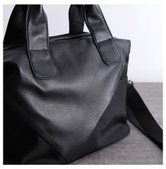 Overview： Design: Womens Nylon Leather Boston Handbags Womens Black Nylon Boston Shoulder Purse for LadiesIn Stock: Ready to Ship (2-4 days)Include: Only BagCustom: NoColor: BlackLeather: Nylon, LeatherMeasures: 26 cm x 23cm x 13cm Weight: 0.5kgSlots: 2 main slots, 2 zipper slot, 1 phone pocket, 1 wallet pocket, 2 side slotsAccessories(option): NoneStyle: Womens Nylon Leather Boston Handbags Womens Black Nylon Boston Shoulder Purse for LadiesVery durable (At least 5 Years) and it should last a l Everyday Black Nylon Shoulder Bag, Versatile Black Bag With Leather Trim, Versatile Black Bags With Leather Trim, Casual Black Bag With Leather Trim, Black Nylon Shoulder Bag For Business, Black Nylon Shoulder Bag With Leather Trim, Black Leather Shoulder Bag For Daily Use, Trendy Black Shoulder Bag With Leather Trim, Functional Black Soft Leather Bag