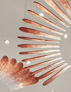 an artisticly designed chandelier hanging from the ceiling