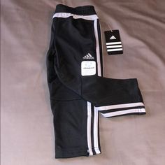 Adidas Children’s Athletic Pants Black With Silver/Gray Stripes (Not White). Zippered Legs. Front Pockets, No Zipper. Brand New, In Original Package With Tags Attached. Available In A Few Different Sizes. Black Athletic Pants, Soccer Pants, Adidas Bottoms, Adidas Sweats, Boy Sweatpants, Athletic Sweatpants, White Joggers, Adidas Three Stripes, Toddler Pants