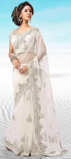 741229 White and Off White  color family Bridal Wedding Sarees, Party Wear Sarees in Net fabric with Stone work   with matching unstitched blouse. White Net Saree, Stone Saree, Latest Indian Saree, Party Sarees, White Saree, Indian Sarees Online, Net Saree, Net Fabric, Stone Work