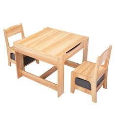 a wooden table with two chairs next to it