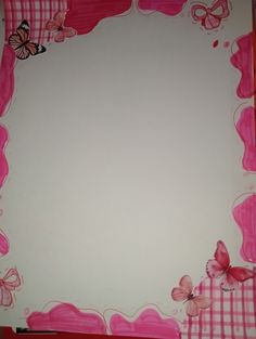 a pink and white wall with butterflies on it