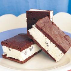 three pieces of ice cream and chocolate cake on a plate