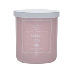 a candle that is pink and white with the words bubble bath on it's lid