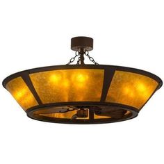 a semi - flush ceiling fixture with three shades of stained glass in an antique finish