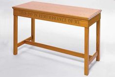 a wooden table with writing on it that says, this is the remembrance of me