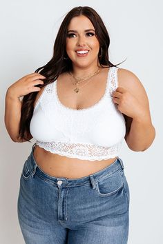 Plus Size - Add a flirty layer and additional coverage to any look with our femme white 'Love In Lace Bralette' featuring gorgeous lace detailing, a scooped neckline, wide shoulder straps with a deep v-cut neckline, and a flattering silhouette that ends in a straight hemline! This bralette comes with removable padding. Measurements XL variant has a Int Cup of A-D", a Int Width of 36-38". 2XL variant has a Int Cup of B-DD", a Int Width of 38-40". White Lace Bodice Camisole Top, White Lace Camisole Top, White Scoop Neck Camisole, Bra Friendly, White Lace Bra Friendly Camisole, White Lace Top Stretch Camisole, White Stretch Lace Top Camisole, White Lace Bra-friendly Top, White Lace Top, Bra Friendly, Comfortable White Lace Top