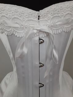 "Custom made Just for you! This striking beautiful pure white satin coutil corset is designed to create the ideal S-bend Edwardian silhouette. Steel boned throughout this lovely corset features front opening German steel busk, professional corset lacing. Handmade in the Canadian Rockies. Please allow 4 to 6 weeks until shipping. Rush orders available for a fee Required measurements Full bust Underbust Waist at smallest Hip at widest Length waist to midbust straight up Feedback on this item.. Tha Edwardian Silhouette, Corset Lacing, Smaller Hips, Steel Boned Corsets, Canadian Rockies, White Satin, Pure White, Lace Detail, Bend