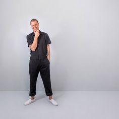 This Jumpsuit Coverall is the Ultimate Uniform. This men's jumpsuit is perfect for the chef in the kitchen or the server in the front of house. It goes from workwear to the street. Made in NYC from a custom stretch twill. Loaded with pockets and functional details like sharpie slots. Coated metal buttons and re-enforced knees for extra durability. Tilit's Signature details: Apron tab on the back, under arm vents, and side tabs for extra adjustments. All pants will arrive at our factory standard Work Jumpsuit Outfit, Men's Jumpsuit, Mens Jumpsuit, Work Jumpsuit, Restaurant Uniforms, Chef Jackets, Chef Pants, Chef Wear, Chef Clothes