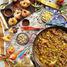 a table topped with lots of different types of food