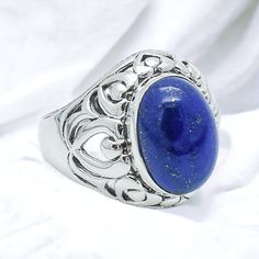 * Metal Material - 925 Sterling Silver * Gemstone - Natural Lapis * All our jewelry is 925 stamped * Free Shipping Worldwide * High-Quality Manufacturing * Made in INDIA * Nickel free * Made in India With Love And High Standards Please get in touch with us if you want to customize this Ring with your choice of Gemstone  We Assure Your Satisfaction With Our High-Quality Jewelry ※ Please let us know if you have any questions or requests. THANK YOU FOR VISITING OUR SHOP:) HAVE A NICE DAY:) Unique Sapphire Ring With Polished Finish As Gift, Spiritual Sapphire Ring In Sterling Silver As Gift, White Gold Cabochon Sapphire Ring Gift, Spiritual Sapphire Ring In Sterling Silver, Elegant Lapis Lazuli Ring As Gift, Spiritual Sterling Silver Sapphire Ring Gift, Classic Lapis Lazuli Ring As A Gift, Fine Jewelry Lapis Lazuli Rings For Gifts, Classic Lapis Lazuli Ring As Gift