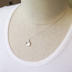 Silver Calla Lily Necklace - Gift for Her Classic and elegant gift for mother, friend or for bridesmaids. Dainty, easy to wear everyday or on special occasions. FEATURES: * A small freshwater pearl is wire wrapped with bright calla lily petal to form a flower pendant. * The petal is rhodium plated over brass. * Comes with sterling silver chain, finished with spring clasp closure. All sterling silver calla lily necklace: https://www.etsy.com/listing/476943360/ MEASUREMENTS: * the pendant is about Silver Birthstone Charm Necklace For Weddings, Silver Charm Necklace With Birthstone For Wedding, Silver Birthstone Charm Necklaces For Weddings, Silver Charm Necklaces With Birthstone For Wedding, Simple Wedding Charm Necklace, Delicate Silver Charm Necklace For Mother's Day, Delicate Crystal Necklace As Gift, Delicate Silver Charm Necklaces For Bridesmaids, Feminine Sterling Silver Necklaces For Gifts