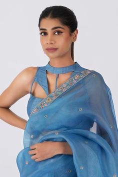 Sky blue saree with floral zardosi and sequin embroidery. Comes with unstitch blouse fabric.
Components: 2
Pattern: Embroidered
Type Of Work: Floral
Fabric: Silk Organza
Color: Blue
Other Details: 
Embroidered border
Note: The stitched blouse worn by the model is not for sale
Occasion: Puja - Aza Fashions Navratri Chanderi Pre-draped Saree With Floral Embroidery, Blue Cotton Silk Dupatta For Reception, Semi-stitched Cotton Silk Pre-draped Saree With Floral Embroidery, Designer Blue Tissue Silk Pre-draped Saree, Blue Tissue Silk Pre-draped Designer Saree, Blue Tissue Silk Pre-draped Saree For Designer Wear, Blue Tissue Silk Blouse Piece For Party, Festive Pre-draped Saree With Floral Embroidery In Raw Silk, Designer Floral Embroidered Pre-draped Saree