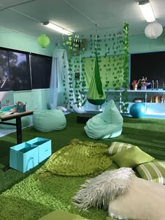 a living room filled with lots of furniture and green carpeted flooring next to a swimming pool