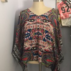 Patterned Never Worn But Took Tags Off Flowy Vibrant Print Blouse, Patterned Flowy V-neck Blouse, Chic Flowy Multicolor Blouse, Flowy Tops With Vibrant Print For Day Out, Chic Multicolor Beach Blouse, Casual Multicolor Boho Print Blouse, Casual Patterned Blouse With Vibrant Print, Chic Multicolor Blouse For Beach, Colorful Long Sleeve Beach Blouse