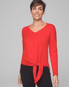 Why you’ll love it: A vertical seam detail leads to an off-center tie front that adds shape and style to this soft sweater—perfect for spring and summer. Details V-neck. Long sleeves. Front side tie. Side slits. 27" from shoulder to hem in front; 29" in back. 55% cotton, 45% nylon. Machine wash cold. Imported. Casual V-neck Top With Tie Sleeves, Long Sleeve Top With Tie Waist For Fall, Casual Long Sleeve Top With Tie Sleeves, Long Sleeve Tie Waist Top For Spring, Casual Tops With Tie Waist For Loungewear, Spring Long Sleeve Tied Tops, Casual Long Sleeve Top With Tied Detail, Relaxed Fit Long Sleeve Tops With Tie Sleeves, Casual Long Sleeve Tied Top