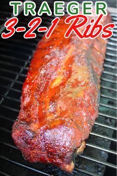 the ribs are being cooked on the grill with text overlay that reads, traeger 3 - 2 - 1 ribs