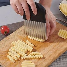 a person is grating cheese on a cutting board