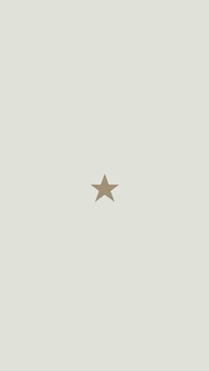 an image of a gold star on a gray background with space for text or photo