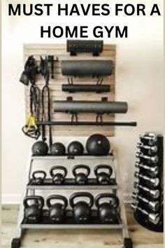 a rack with kettles and exercise equipment in front of a wall that says must have for a home gym