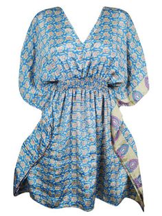 Women Beach Kaftan Dress, Blue, White Floral Short Summer Dresses, One size Get ready to embrace luxury and relaxation in one modern, eye-catching piece with our Blue, White Floral Floral Resort Wear Kaftan Dress! This one size dress is a must-have for any occasion, combining lightweight fabric with a timeless, chic design that will surely make a statement. Experience ultimate comfort and style on your next resort getaway with this bold and adventurous dress. The kimono caftan works well as a be Beach Short Dress, V-neck Kaftan With Vibrant Print For Beach, Beach Kaftan Dress, Blue Printed Resort Cover-up, Vibrant Print V-neck Kaftan For Beachwear, Patterned Floral Print Kaftan For Beach Cover-up, Blue Floral Print Beach Cover-up Kaftan, Short Beach Dresses, Beach Kaftan