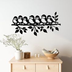 a wall decal with birds sitting on a branch