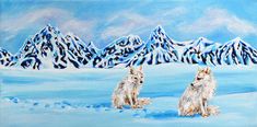 two dogs sitting in the snow with mountains in the backgrouds behind them