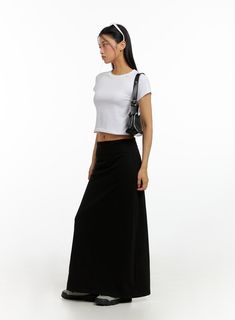 Product Detail Style : Street Detail : Banded Print : Solid Material : Cotton, Polyester Length : Maxi Cotton60 Polyester40 Color : Black, Gray Made in Korea Model Size Model is wearing size S/M and the color Black. Height : 5'7" | 169cm / Top : XS / Bottom : S (25 inch) .prddescription table, .prddescription td, .prddescription th { border : 1px solid black; border-collapse : collapse; padding: 10px; } Size(Inch) Size Waist Hip Hem Total Length S/M 27.6" 34.6" 24.2" 39.0" - The measurement can Black Bottom White Top Outfit, Black Long Skirt Outfit, Long Black Skirt Outfit, Black Maxi Skirt Outfit, Low Rise Jeans Bootcut, White Tops Outfit, Black Maxi Skirt, Festival Trends, Long Skirt Outfits