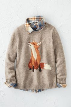 a sweater with an image of a fox on the front, and plaid collared neckline