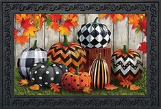 a painting of pumpkins and gourds in front of a fence