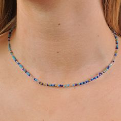 Description Dainty Beaded Necklace Blue Mini beaded necklace Length 40cm Perfect for layering with other necklaces Sailor clasp fastening  Nicely packaged ready for gifting Blue Round Beads Layered Necklace For Gift, Blue Layered Necklace With Round Beads As A Gift, Blue Layered Necklace With Round Beads For Gift, Blue Spacer Beads Jewelry For The Beach, Blue Faceted Beads Crystal Necklaces, Blue Adjustable Layered Necklace As Gift, Blue Jewelry With Tiny Round Beads, Adjustable Blue Layered Necklace Gift, Adjustable Blue Layered Necklace As Gift