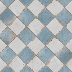 a blue and white tiled floor with small squares