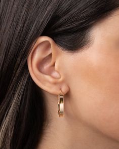 Boldly define your look with these 14k Gold Large Flat Hoop earrings, featuring an edgy, geometric shape and sharp edges for a thick, confident style. Outer Diameter: Approx. 25mm Inner Diameter: Approx. 18mm Width: Approx. 4mm Total Weight: Approx. 2.5 grams (per pair) Standard Production: 3-5 business days Rush Order Production: 2-3 business days Shipping: Select shipping method at checkout. Shipped from our L.A. Studio. This item is Final Sale. See here for details. Modern Rose Gold Pierced Huggie Earrings, Modern Rose Gold Pierced Hoop Earrings, Modern Rose Gold Hoop Earrings, Modern Rose Gold Huggie Earrings, Modern Pierced Hoop Earrings For Everyday Luxury, Modern Single 14k Gold Hoop Earring, Modern Hoop Earrings For Everyday Luxury, Modern Rose Gold Tarnish Resistant Hoop Earrings, Modern Rose Gold Tarnish-resistant Hoop Earrings