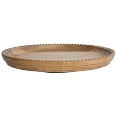 an oval wooden tray with scalloped edges and beading on the rim, set against a white background