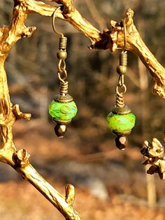 Love the rustic appeal with these Picasso Czech glass Earrings. The green catches the sun and just pops with color.  Simple but make an artistic classy statement.  Handmade and hypoallergenic. Gift wrapping available and Wholesale orders Welcome Nature-inspired Green Hypoallergenic Jewelry, Nature-inspired Hypoallergenic Green Jewelry, Green Hypoallergenic Nature-inspired Jewelry, Artisan Green Earrings As Gift, Green Bohemian Earrings As Gift, Bohemian Green Earrings As Gift, Green Bohemian Earrings With Ear Wire, Artisan Green Earrings For Gift, Bohemian Green Earrings For Gift