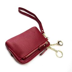 Effortless Elegance: Handle Small Wallet - A Multi-Functional Essential for the Modern Woman. This Solid Color Leather Wallet is not just a stylish accessory but also a compact, multi-card, and keychain holder. With a secure zipper closure, it's the perfect blend of fashion and function, making it a must-have for your everyday essentials. Lining Material: Polyester Main Material: Genuine Leather Versatile Wallet With Interior Key Chain Holder As Gift, Travel Card Holder With Interior Key Chain, Card Keychain, Mini Coin Purse, Keychain Wallet, Color Fashion, Coin Purses, Small Wallet, Elevate Your Style