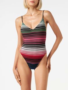 Woman one piece swimsuitMulticolor stripes all over printThin strapsRegular fitV neckComposition: 90% Polyamide 10% elastaneCare instructions: Cold hand wash. Do not soak. Do not iron. Do not dry off in contact with other garments. Rinse after contact with chlorine or salt water Sleeveless Striped Bodysuit For Pool, Striped Sleeveless Bodysuit For Beachwear, Striped Beachwear Bodysuit For Poolside, Striped Seamless Fitted Swimwear, Striped Fitted Seamless Swimwear, Fitted Striped Seamless Swimwear, Striped Bodysuit For Poolside Beachwear, Striped Bodysuit For Poolside In Summer, Striped Stretch Bodysuit For Poolside