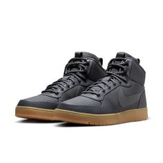 Nike Court Borough Mid Winter 'Grey Gum' AA0547-001 Gray High-top Sneakers With Gum Sole For Sports, Nike Sneakers With Boost Midsole For Winter, Sporty Gray Winter Sneakers, Nike Gray Sneakers For Outdoor Activities, Gray Sneakers For Winter Streetwear, Winter Leather Sneakers In Gray, Gray Leather Winter Sneakers, Gray Winter Outdoor Sneakers, Winter Leather Gray Sneakers