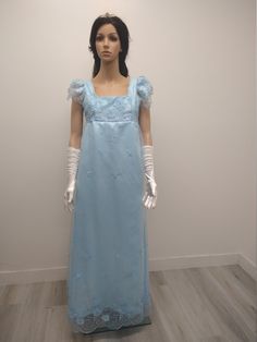 Nice and elegant evening gown perfect for costume or dress up party, made with blue satin under blue embroidered organza with 4 mm blue crystal stones, short sleeve and zipper on the back , this dress up set includes a pair of marching gloves and a beautiful hair clip , this dress is made to order with the same material as pictured, THERE IS NO RETURNS AND EXCHANGES ACCEPTED PLEASE BE SURE TO CHECK THE MEASUREMENTS ON THE BOTTOM OF THE DESCRIPTION. If for any reason the measurements don't match Fairytale Evening Ball Gown Dress, Fairytale Evening Ball Gown, Fitted Fairytale Prom Dress, Fitted Victorian Marie Antoinette Dress For Party, Fitted Short Sleeve Dress For Cosplay Events, Princess Style Fitted Victorian Party Dress, Fitted Princess Style Victorian Dress For Party, Fitted Princess-style Victorian Dress For Parties, Elegant Fitted Costumes For Parties