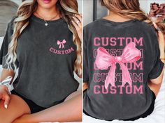 How to Order Your Custom Design T-shirt: * Choose your t-shirt color * Choose your size * Choose your design&text color * PLEASE make sure all your order's steps Features: ↠ Sideseamed ↠ Shoulder taping ↠ Fitted at bicep ↠ Retail fit ↠ Unisex sizing ↠ White and black colors: 100% Airlume combed and ring-spun cotton, 32 singles ↠ Heather Colors: 4.2 oz., 52% airlume combed and ring-spun cotton, 48% polyester, 32 singles SHIPPING AND PRODUCTION TIME ↠ Production time is 1-2 business days (depending on proof approval). ↠ Shipping Time is 1-2 Business Days. ↠ If you are in a rush, please contact us. Dance Team Shirts Design, Dance Team Shirts, School Team Shirts, Team Shirt Designs, Shirt Coquette, School Spirit Shirts, Senior Shirts, Bow Shirt, Team Mascots