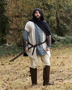 "This wool short cape is great for your next costume or everyday wear! If you plan on adventuring in the wild, this is the garment for you! The cape has a naturally fringed raw hem for extra flow and texture. You can also now choose to add a hood as well! Achieve a great medieval/fantasy look with this simple garment handmade in the U.S. The weight is distributed across the shoulders so you don't experience the \"cape choke\" that can so often be a problem. Choice of 3 colors: Navy Blue, Chocola Medieval Cape For Larp In Fall, Medieval Style Cape For Larp In Fall, Medieval Cape For Fall Larp Events, Medieval Long Sleeve Cape For Larp, Elvish Cape For Larp In Fall, Elven Style Cape For Larp In Fall, Elven Cape For Larp In Fall, Medieval Leather Armor, Fantasy Look