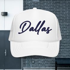 Dallas 3D Puff Hat, D-Town Trucker Hat, Texas Hat, Big D Hat, Cowboy Hat, Football Hat, Gift For Her, White/Navy  Embroidered Foam Trucker Hat Stand out from the crowd with this trendy foam trucker hat! This head accessory is made with high-quality polyester and foam that guarantees a premium look and feel. The foam trucker hat has an adjustable snap that ensures a comfortable fit, and the mesh back provides great breathability. The matching color braid gives the hat an extra oomph. Style it with your favorite outfit any time of the day. * 100% polyester front * 100% polyester mesh back * Thicker and heavier fabric, laminated with high-density, non-toxic foam * Structured, 5-panel cap, high-profile * 8 rows of stitching on a pre-curved visor * Seamless foam front panel with lining * Matchi White Dad Hat With Letter Print And Flat Bill, White Flat Brim Baseball Cap With Letter Print, White Snapback Hat With Letter Print And Short Brim, White Trucker Hat With Letter Print, White Trucker Hat With Short Brim, White Letter Print Curved Brim Trucker Hat, White Trucker Hat With Letter Print And Curved Brim, White Trucker Hat With Letter Print And Flat Brim, White Trucker Snapback Hat With Short Brim