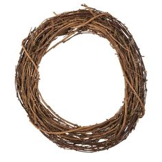 a wreath made out of twigs on a white background