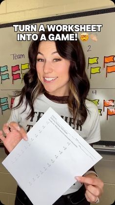 a woman holding up a piece of paper with the words turn a worksheet into a game