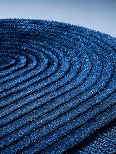 a close up view of a blue rug