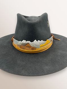 Hand-Carved Leather Hat Band. Adjustable closure to fit any hat size. Custom Adjustable Fedora For Formal Occasions, Adjustable Fedora For Formal Occasions, Luxury Adjustable Felt Hat, Luxury Felt Hat With Adjustable Flat Crown, Luxury Adjustable Felt Hat With Flat Crown, Luxury Adjustable Fedora Felt Hat, Adjustable Western Hat For Town, Luxury Adjustable Felt Fedora Hat, Western Style Adjustable Hat For Town