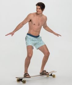 Experience effortless comfort with the Lemon Squeezy Swimsuit! Dive into the refreshing feeling of easy, peezy, lemon squeezy with this must-have summer essential. 5.5" inseam, water-repellent, and breathable with 4-way stretch for a full range of motion and a compression brief liner. Patrick is 6’2” and is wearing a medium. Summer Bottoms For Water Sports, Casual Surfing Bottoms For Summer, Summer Water Sports Bottoms In Short Length, Yellow Bottoms For Summer Surfing, Casual Surfing Bottoms For Warm Weather, Relaxed Fit Bottoms For Surfing In Summer, Relaxed Fit Bottoms For Summer Surfing, Yellow Short Bottoms For Surfing, Green Beachwear Bottoms For Water Sports